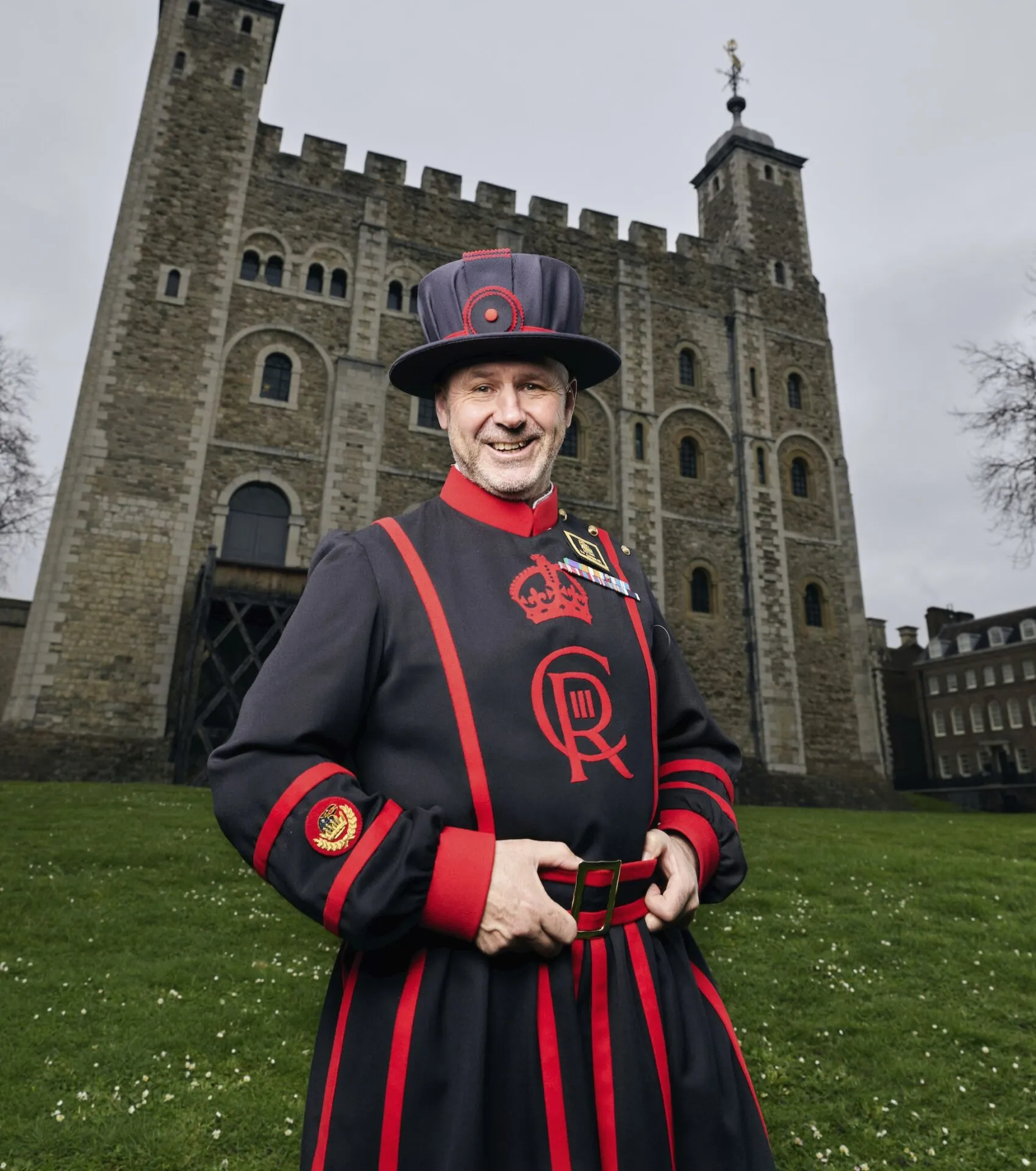 Yeoman Warder standing on the lawn at the Tower of London